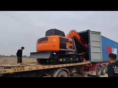 excavators into container